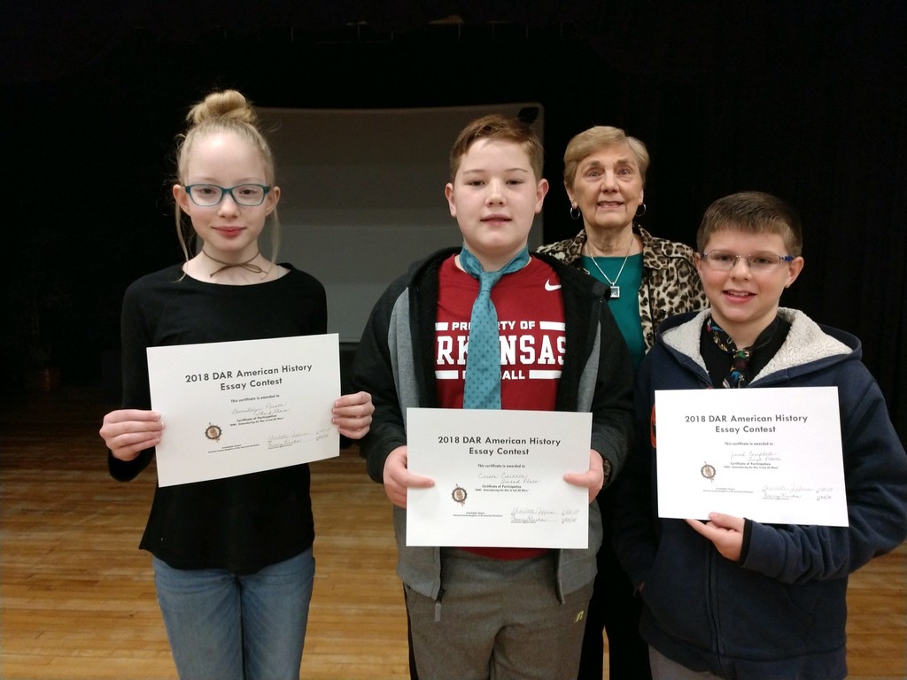 DAR essay contest winners with presenter