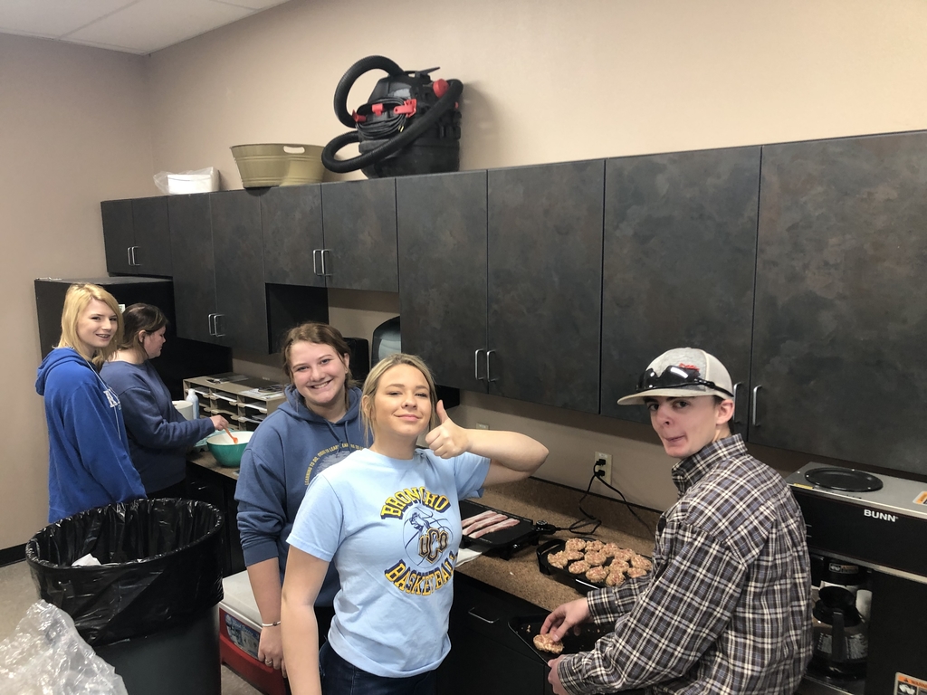 FFA members cooking for the teachers 
