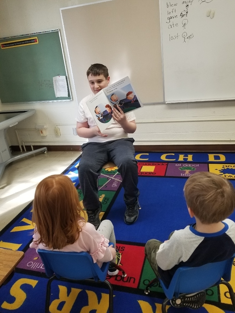 Reading to the kindergartners today. How fun March is reading month is!!! #wolverineslead