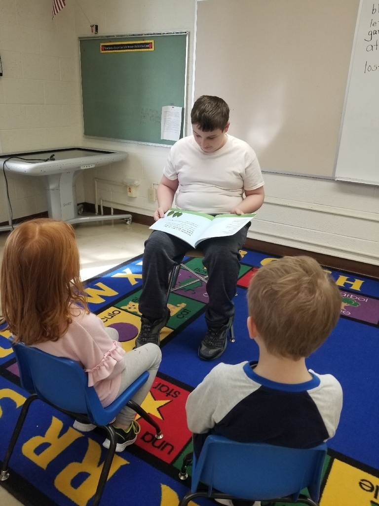 Reading to the kindergartners today. How fun March is reading month is!!! #wolverineslead