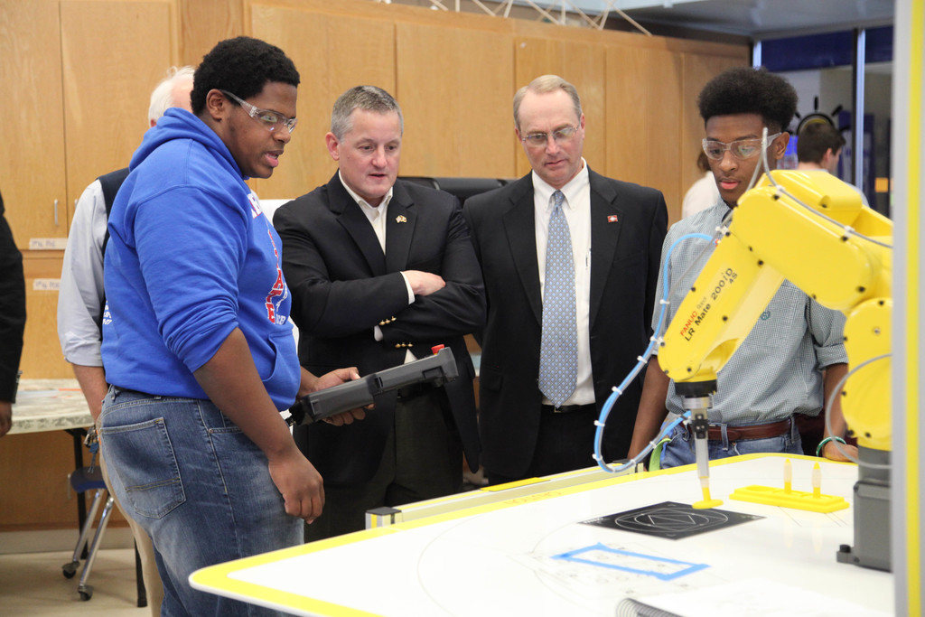 congressman westerman visits with two AHS students
