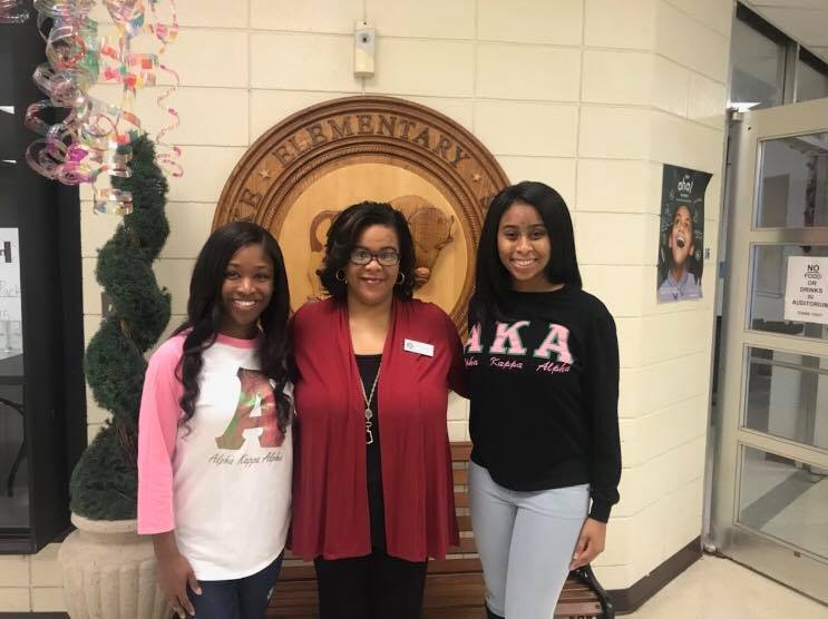 Ms. Snowden with two HSU students