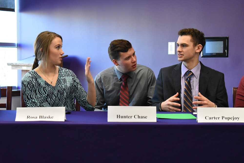 Rosa Blaske, Hunter Chase, and Carter Popejoy prepare for the hearings.